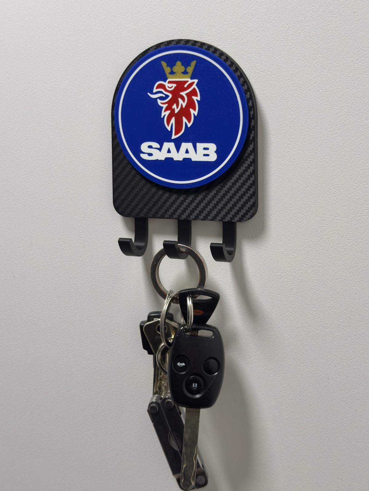 Saab naulakko